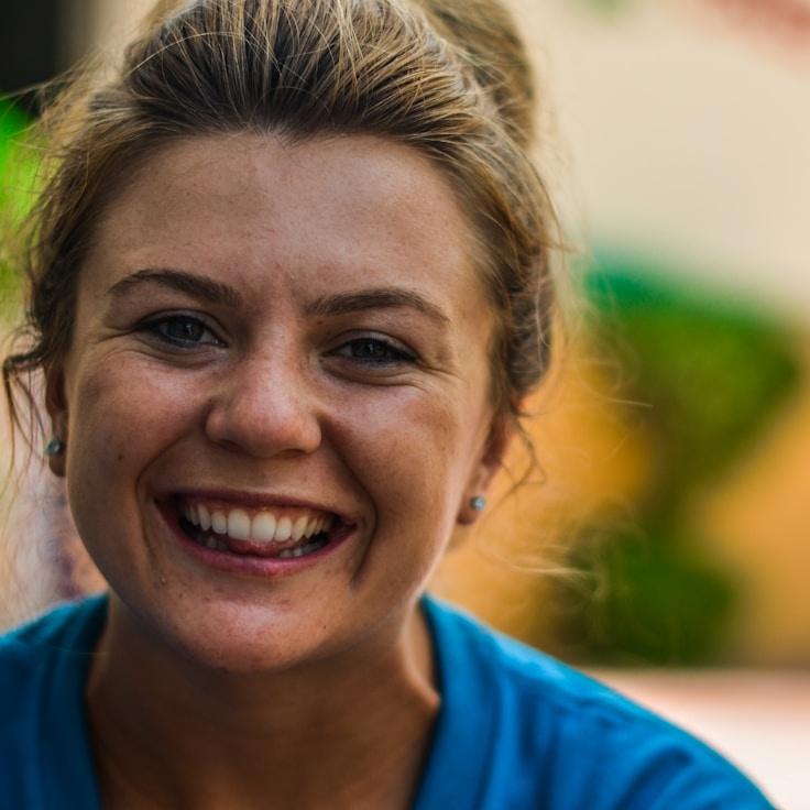 Alex Chen, Lead Design Curator at Integrated Platform Structure, reviewing corporate floral arrangements